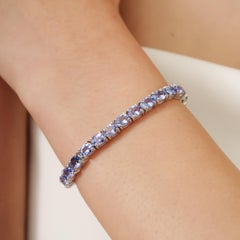 Bracciale tennis stile eternità con tanzanite taglio ovale di Silvorra in A. Silver