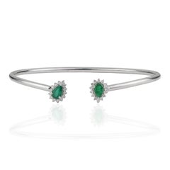 Silvorra Bracelet manchette ouverte en argent 925 avec émeraude taillée en poire et halo de diamants