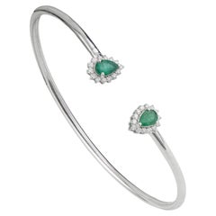 Silvorra Bracelet manchette ouverte en argent 925 avec émeraude taillée en poire et halo de diamants