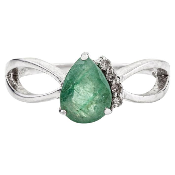 For Sale:  Silvorra Pear-Cut Natural Emerald 
Diamond Twisted Bypass Silver Ring for Her