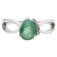 Silvorra Pear-Cut Natural Emerald 
Diamond Twisted Bypass Silver Ring for Her