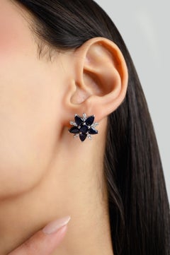 Silvorra Pear Shape Blue Sapphire Starburst Silver Earrings in Diamonds for Gift