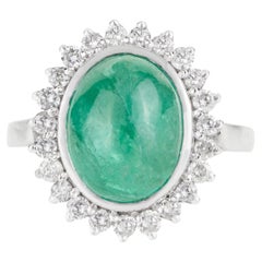 Silvorra Retro Oval Cut Cabochon Emerald Ring with Halo Diamonds in Silver