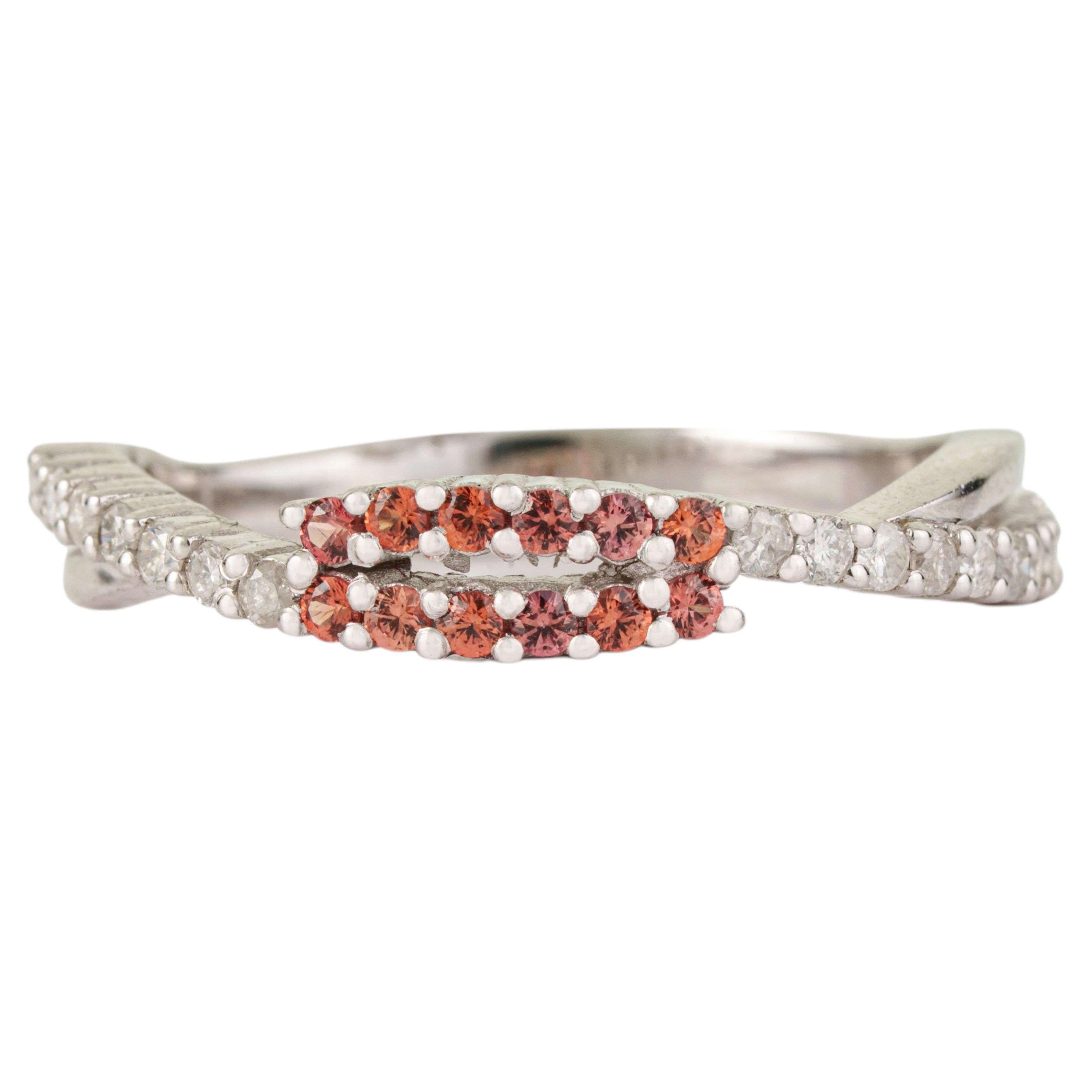 For Sale:  Silvorra Round Orange Sapphire & Diamond Shank Crossover Ring in Solid Silver