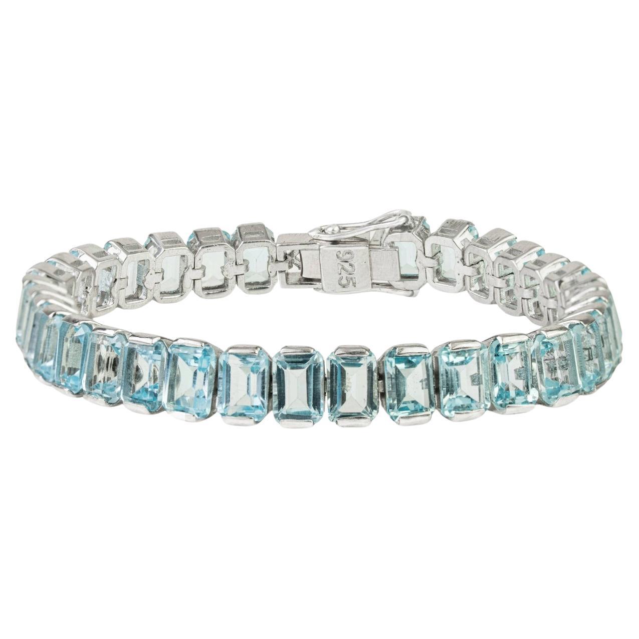 Silvorra Statement 41.5 Ct Blue Topaz Silver Tennis Bracelet Classic Line Design