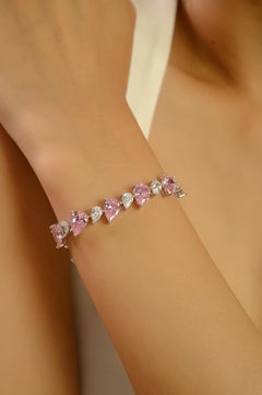 Silvorra Sterling Silber Tennisarmband mit rosa & weißen birnenförmigen CZ Steinen
