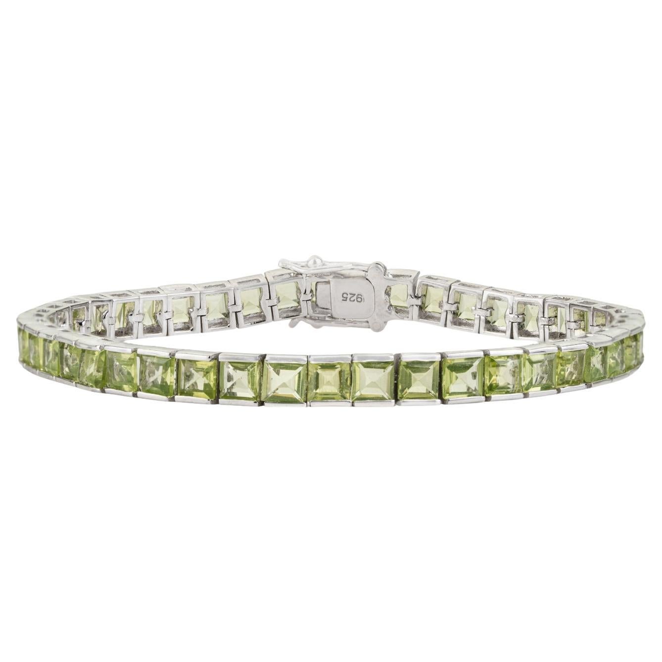 Bracciale tennis strutturato con peridoto taglio quadrato in argento 925 per donna di Silvorra