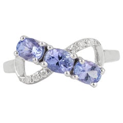 Silvorra Drei-Stein-Ring mit Saphir und Diamanten in Form einer Schleife aus Sterlingsilber für sie