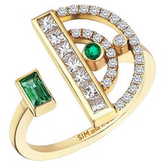 Sim- und Roz-Gelbgoldring mit Diamanten im Rund- und Prinzessinnenschliff und Smaragd