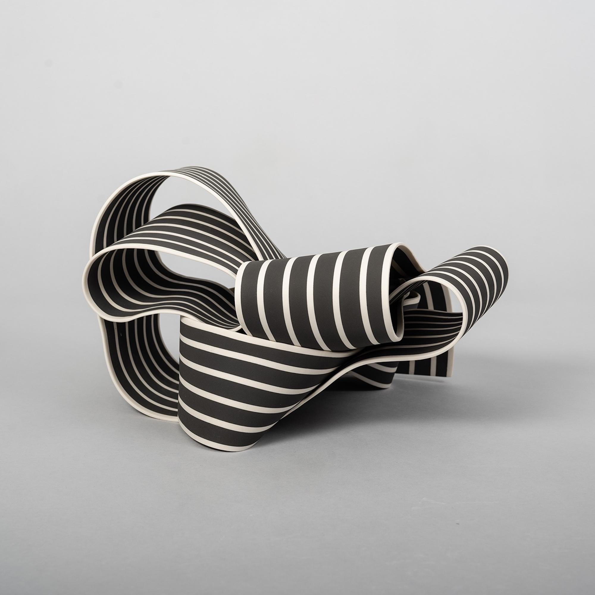 Entrapped 8 is a unique paper porcelain sculpture by contemporary artist Simcha Even-Chen, dimensions are 21 × 30 × 27 cm (8.3 × 11.8 × 10.6 in). 
The sculpture is signed and comes with a certificate of authenticity.

This sculpture is a part of the