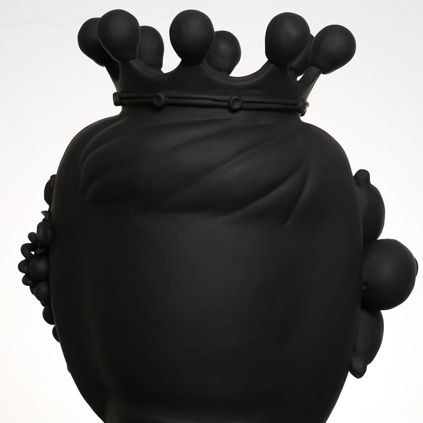 black head vase