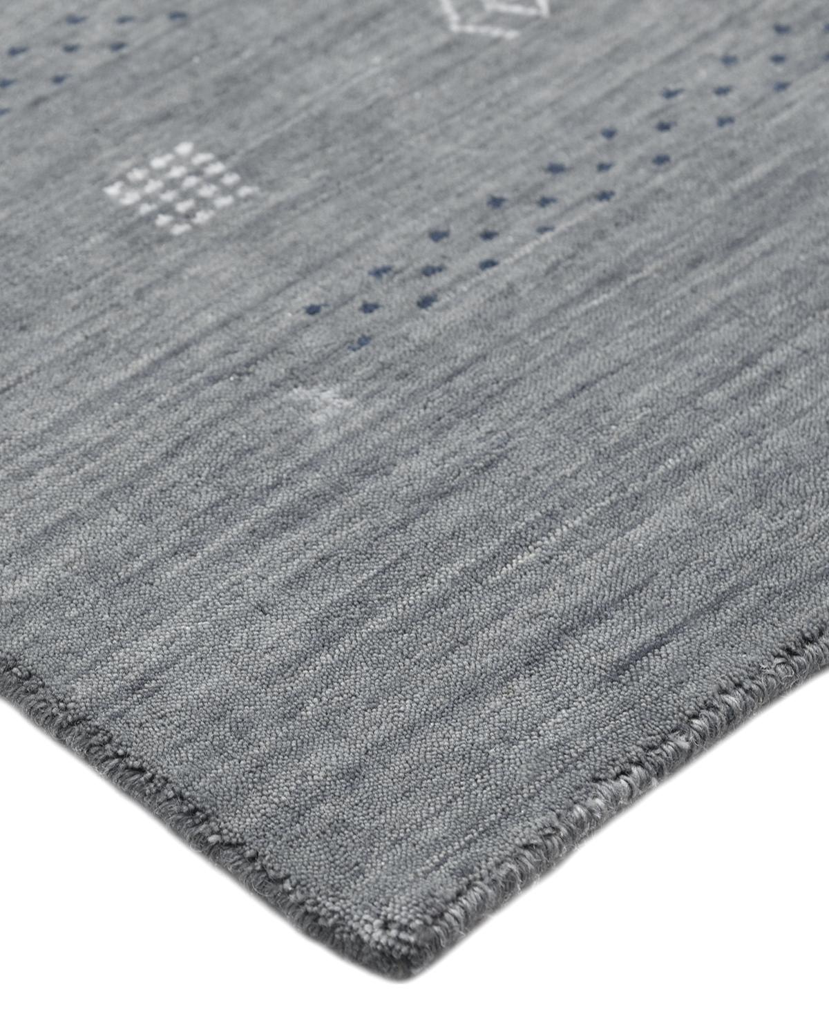The Gabbeh Inspired Collection, made in India, boasts a sumptuous pile that will pamper your bare feet, making these rugs especially welcome in bedrooms. Subtle color variations among the seemingly simple geometric motifs add to the bohemian allure.