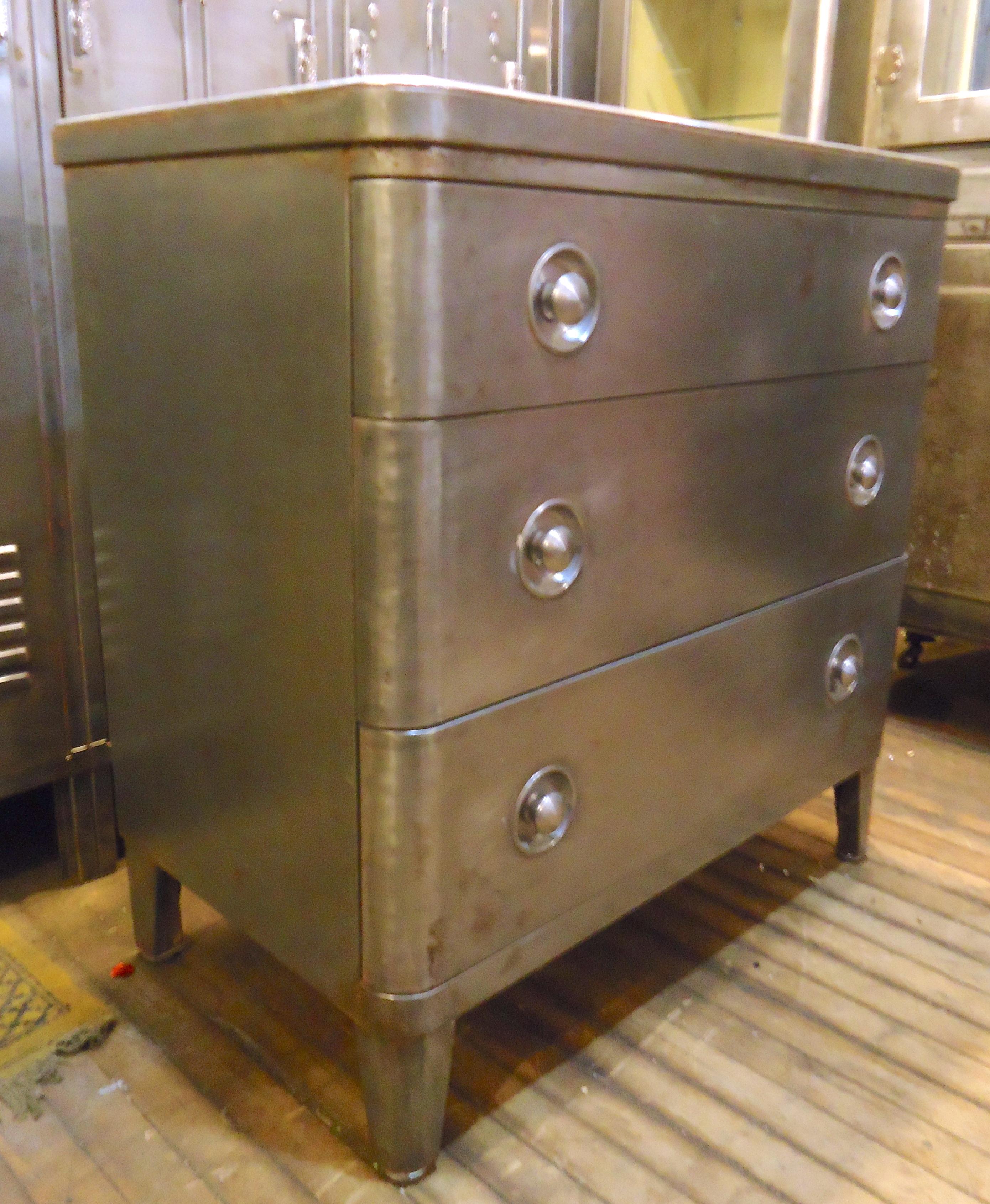 Restored metal dresser with laminate top and three wide drawers. 

(Please confirm item location - NY or NJ - with dealer).
 