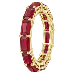 Bracelet éternel en or jaune 18K avec rubis birman taille émeraude