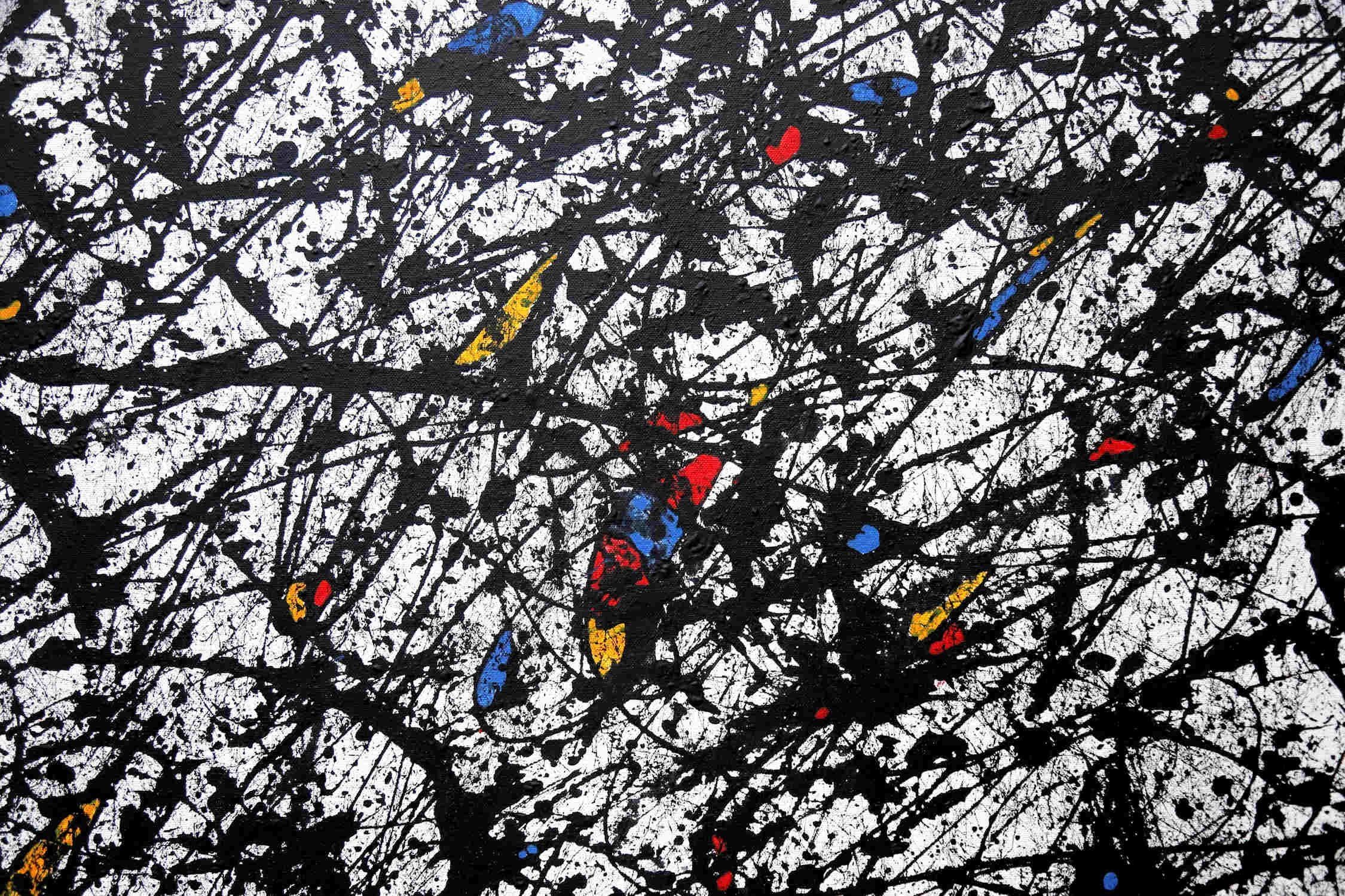 A large abstract painting in Black and White tones with primary highlights. Minimalist simplicity, Jackson Pollock inspired with a touch of Mondrian colour. A wonderful highlight and focal point for a feature wall, perhaps above a bed or sofa,