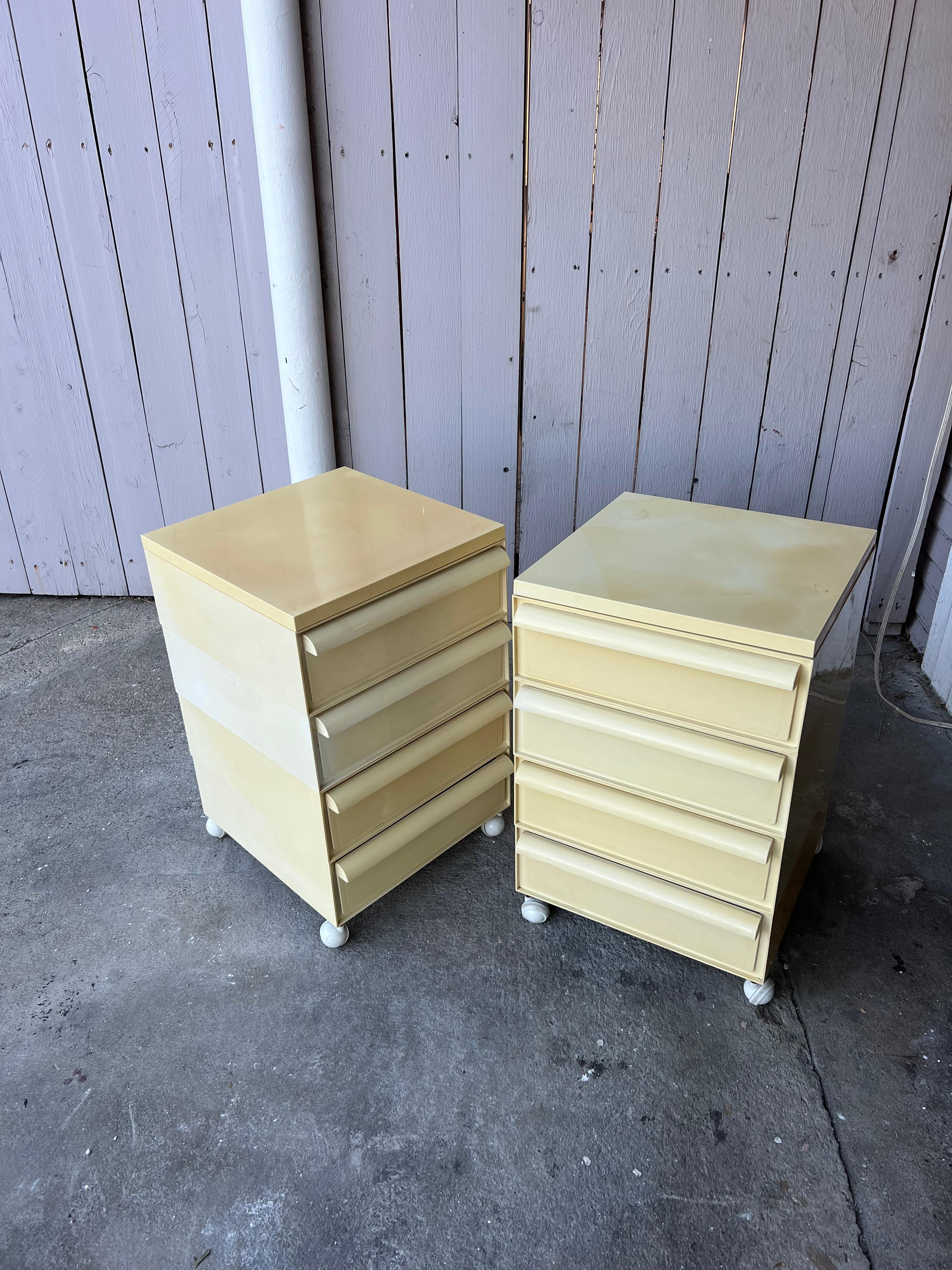This listing includes four stacking drawers, one top, and four wheels. Two sets available.

 These drawers are from the 1970s and have some discoloration and wear that is consistant with age and use. Please see photos for details. They are 100%