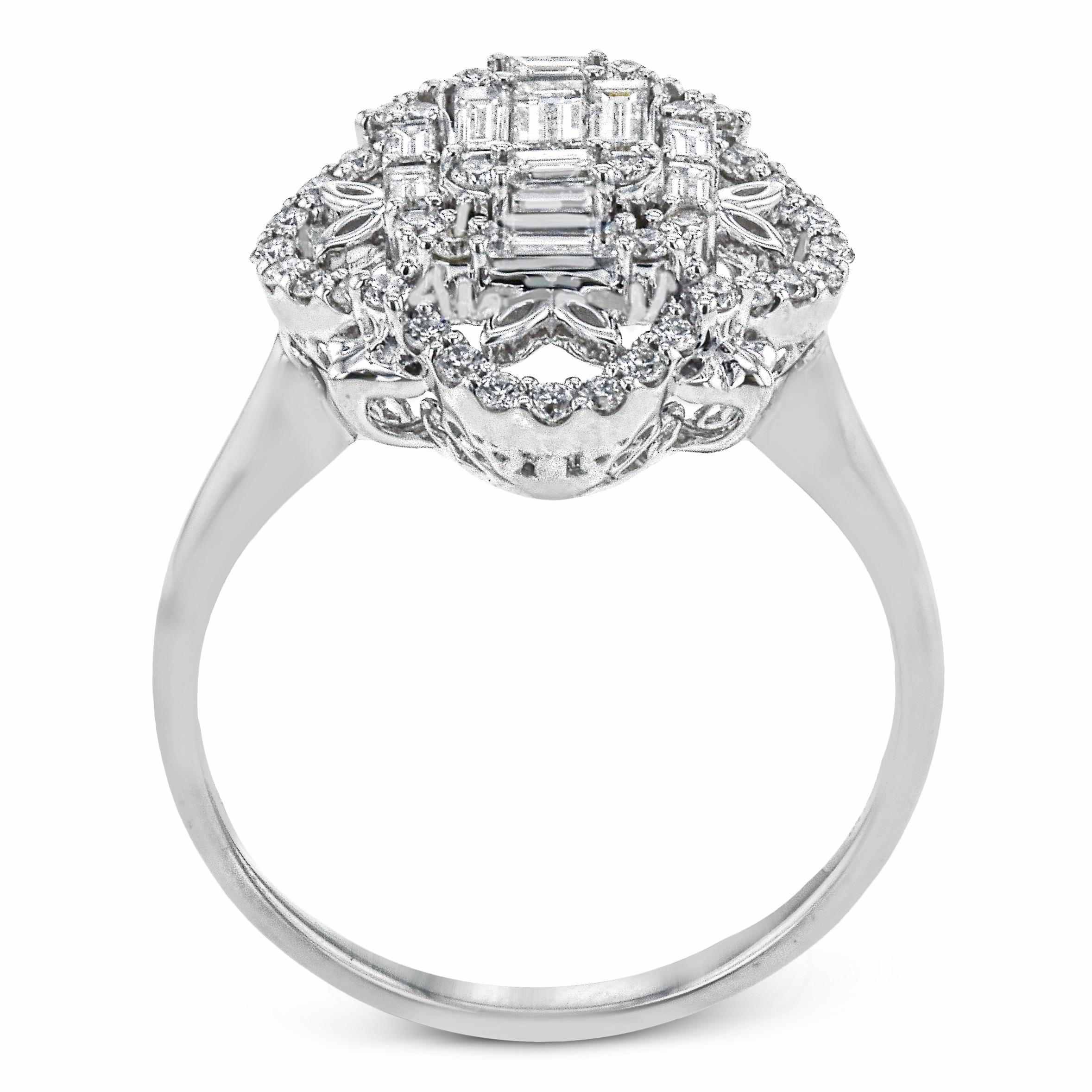 This vintage style fashion ring from Simon G features 0.35 carat total weight in baguette diamonds and 0.32 carat total weight in round brilliant cut diamonds set in 18 karat white gold. This ring is a size 6.25 but can be resized upon request.