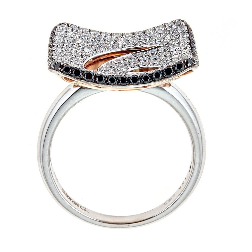 Simon G 18 Karat Two-Tone Gold Ring Black and White 1.36 Carat Diamond Dome Ring Jewelry Size 7 

Designed by Simon G, this swirl design cocktail ring features white and black shimmering diamonds, together totaling 1.36 TCW. Modern design makes this