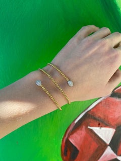 Simon G Bangle a tripla torsione in oro giallo/bianco da 18 carati con diamanti da 0,30 ct.