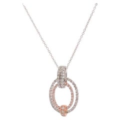 SIMON G Colgante de Lazo de diamantes de 18 quilates. Collar de diamantes con pavé de oro blanco y rosa de 18k.