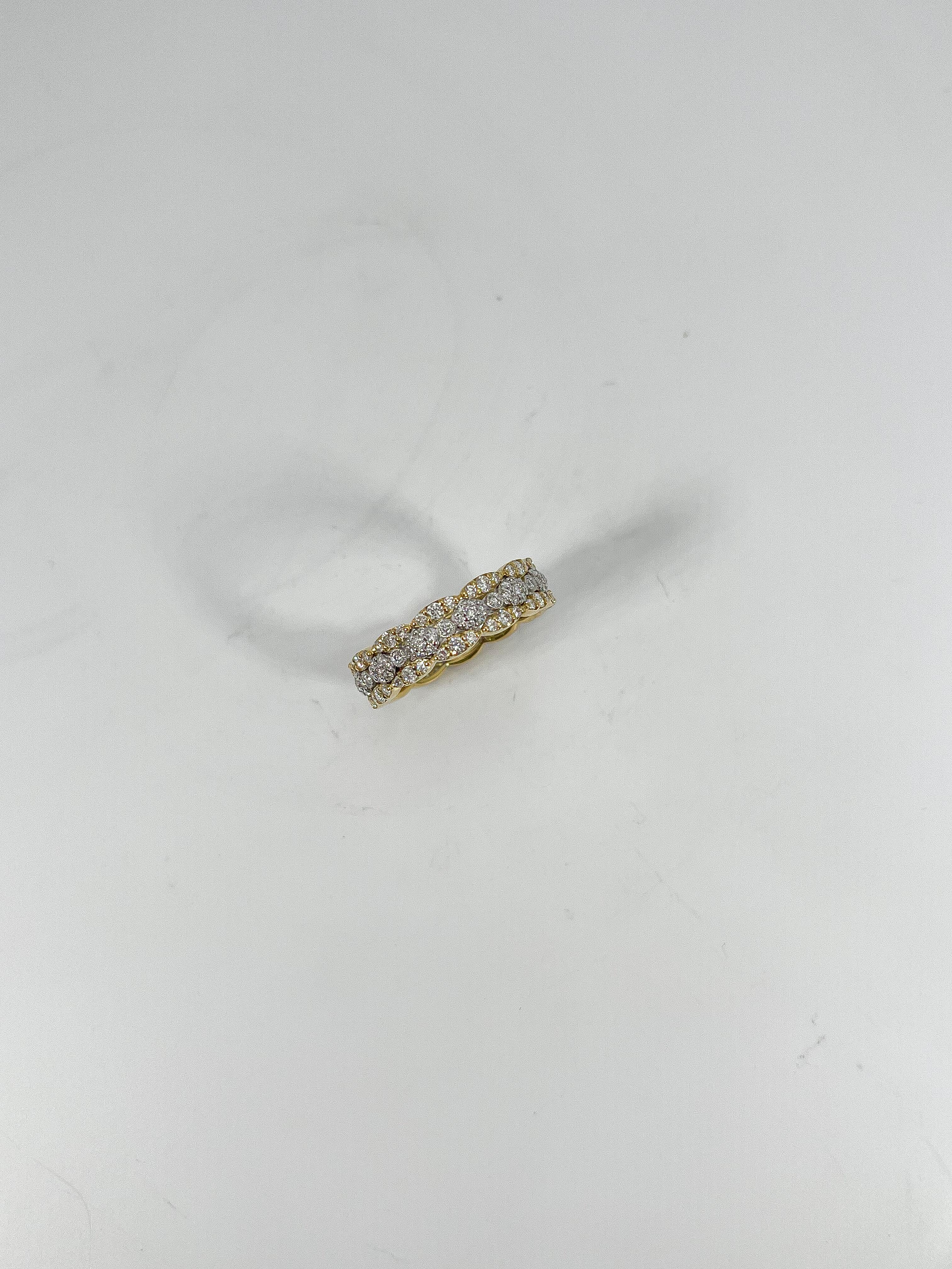 18k two toned .97 CTW diamond fashion band. The diamonds in this ring are all round, the width is 5.3 mm, the size of the ring is a 6 1/2, and it has a total weight of 5.25 grams. 
Part number- LR2387-A