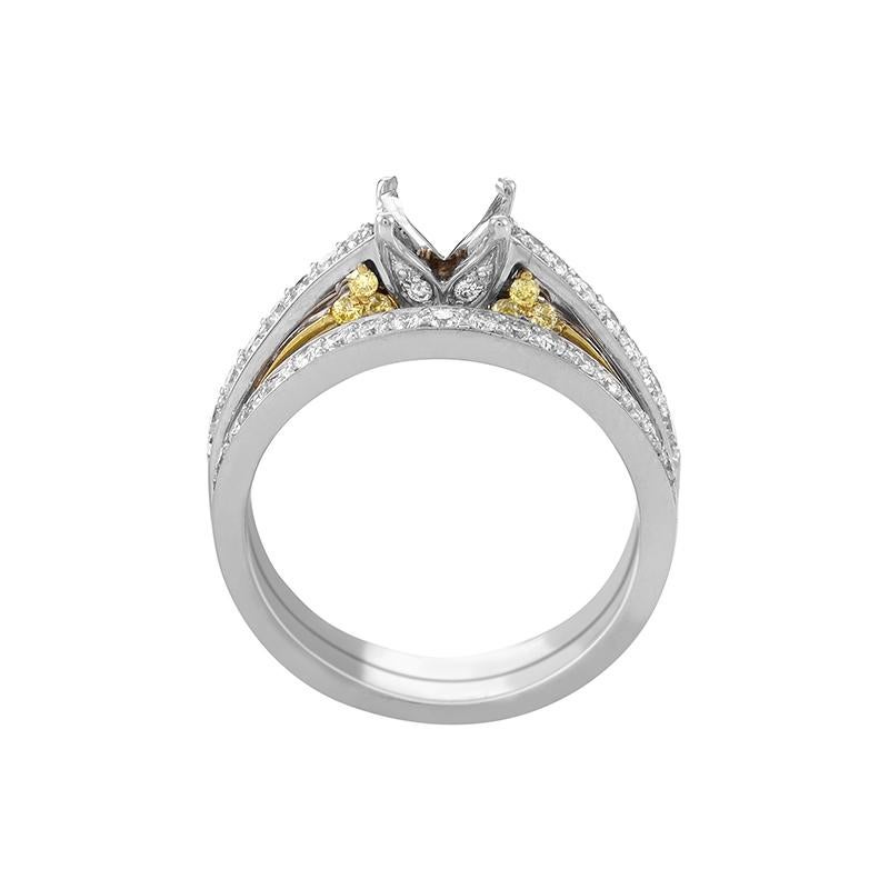 An exquisite bridal set from celebrated Simon G. consisting of tastefully designed wedding band and a mounting ring, made of topnotch 18K white gold combined with 18K yellow gold, and decorated with 0.50ct of diamonds.
