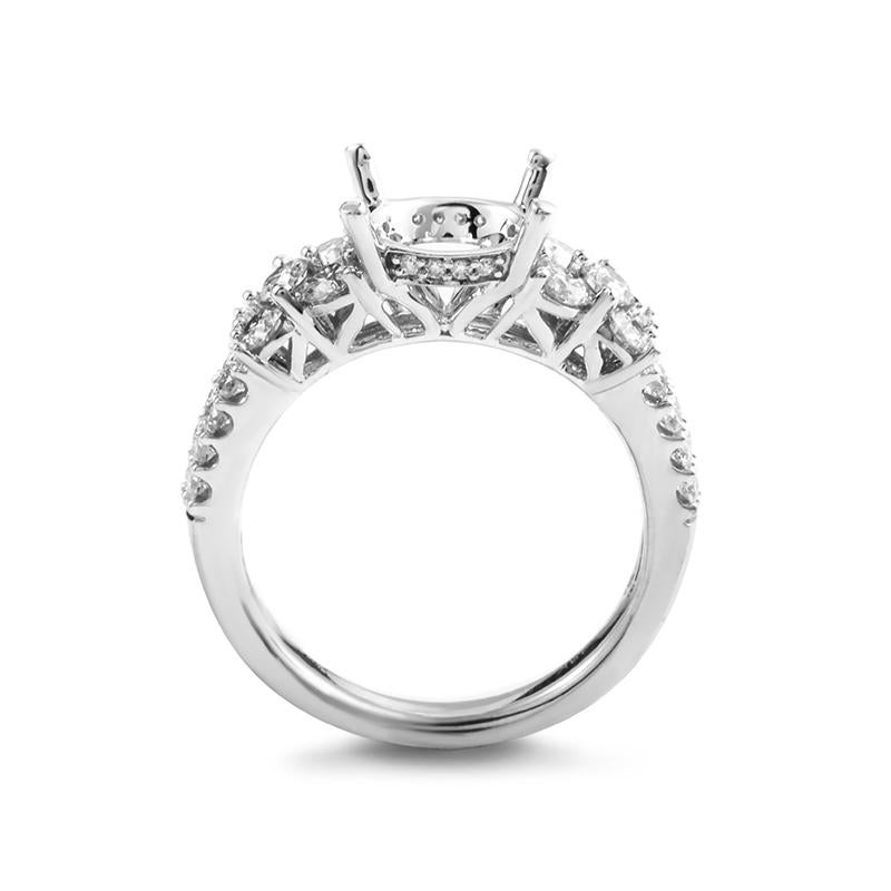 Luxurious and tasteful, this gorgeous semi-mount ring by Simon G. is splendidly crafted from exemplary 18K white gold, and embellished with shimmering white diamonds.
