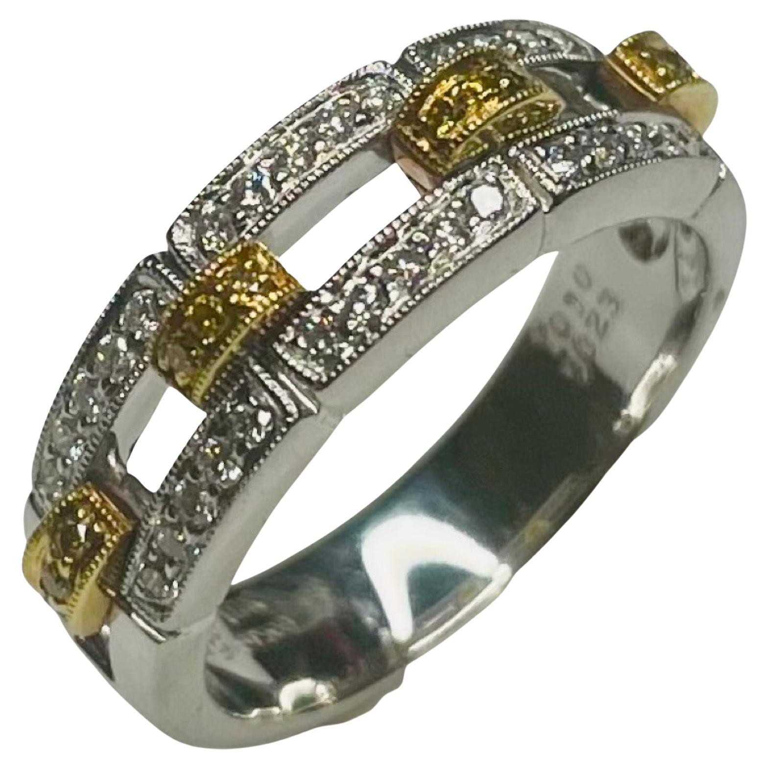 Simon G 18K Yellow Gold and Platinum Natural Yellow and White Diamond Band. This band has 30 full cut round brilliant diamonds of VS clarity and G color. There is a total white diamond weight of 0.23 carats. There are 12 fancy intense yellow