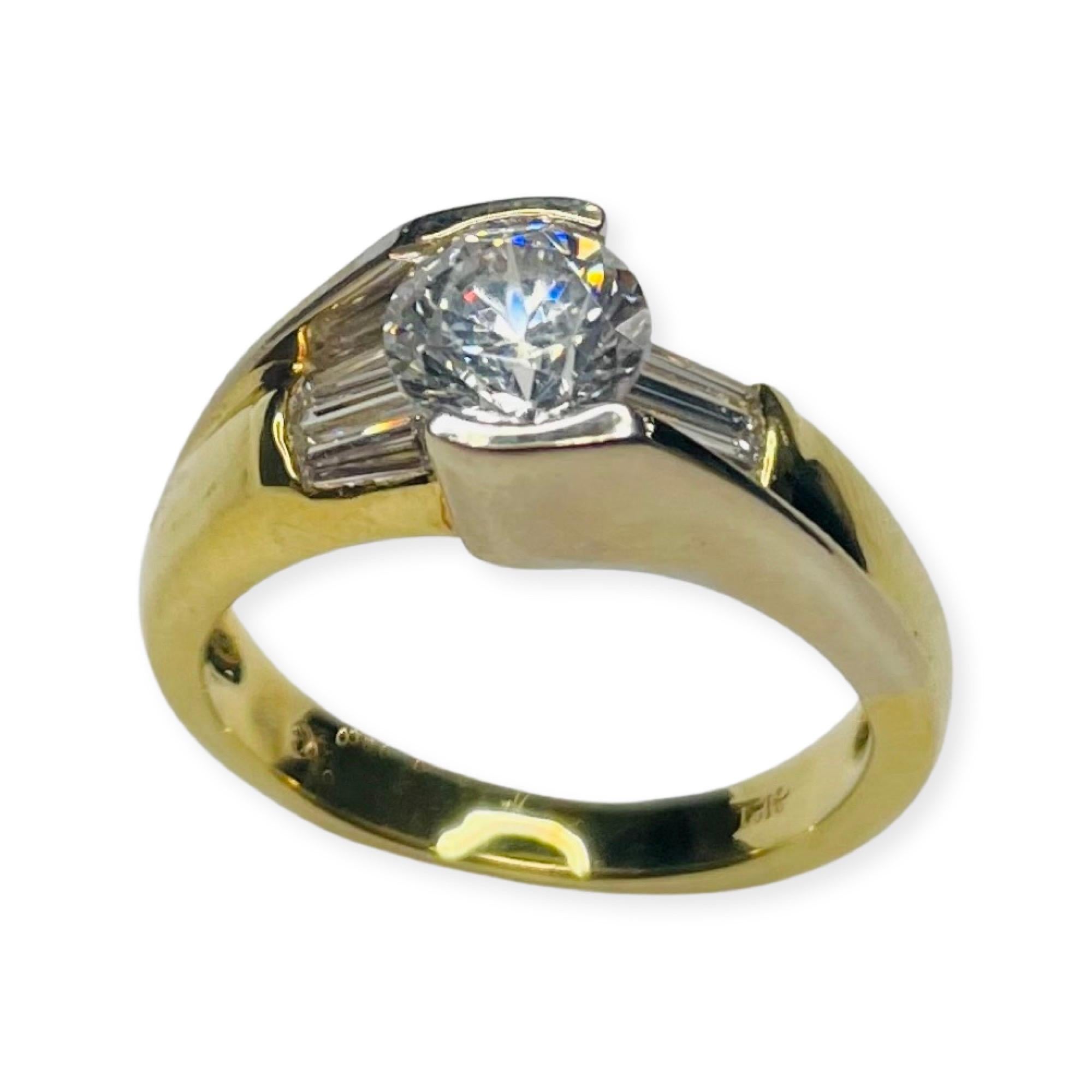 Simon G 18K Yellow and White Gold Diamond Engagement Ring. The center is a 6.5 mm Cubic Zirconia. It is equivalent to a 1.0 carat diamond. It can be replaced with a lab created or natural diamond, colored stone or moissonite for an additional fee. 