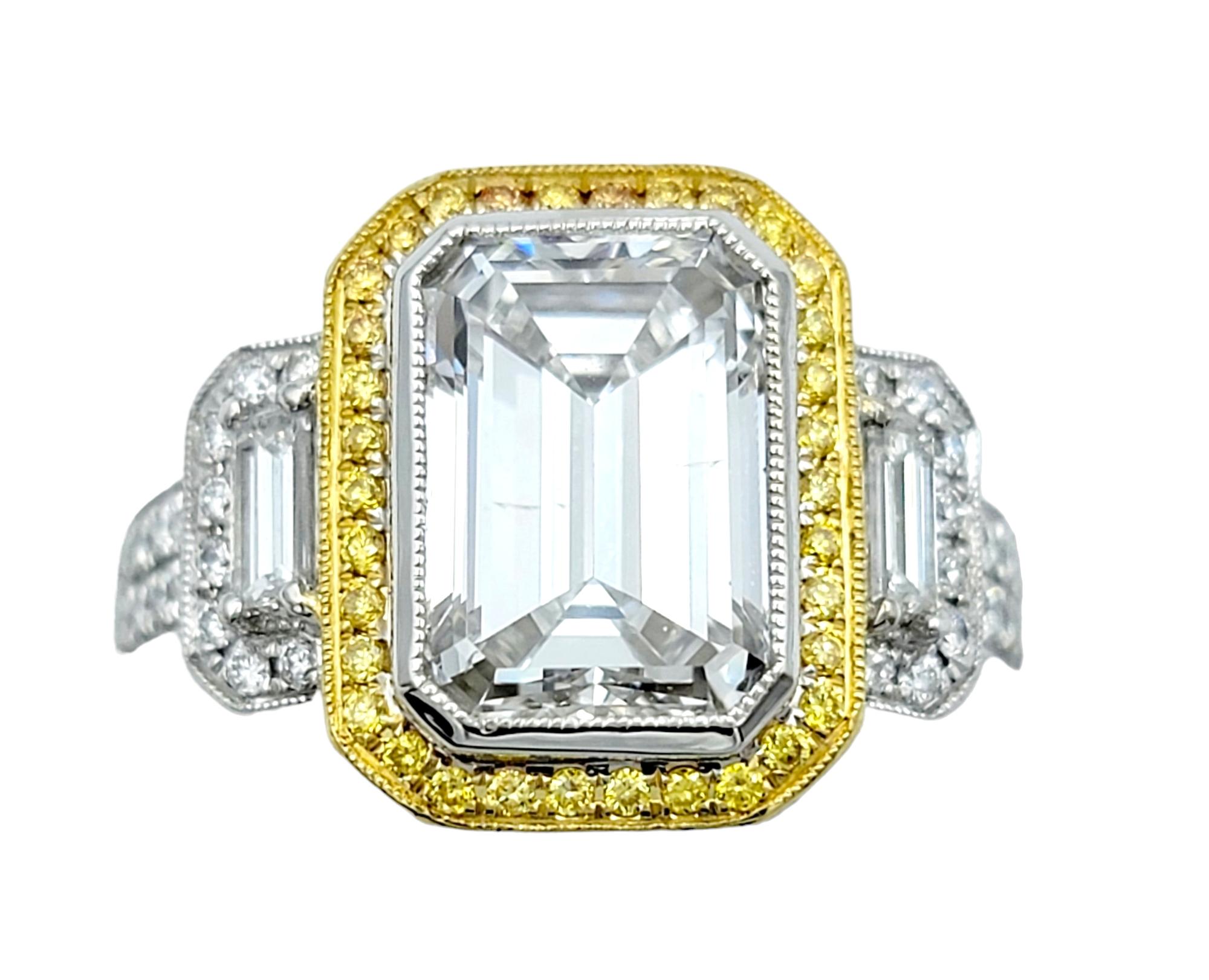 Ring Size: 6

This incredible Simon G. 3.50 carat emerald cut diamond engagement ring is an absolute masterpiece of jewelry design, merging classical elegance with contemporary charm. 

The striking centerpiece, an emerald-cut diamond, is