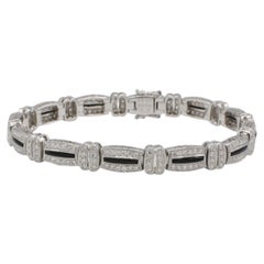 A. Simon G. Bracelet en or blanc 18 carats, diamant naturel et onyx noir, style Art déco