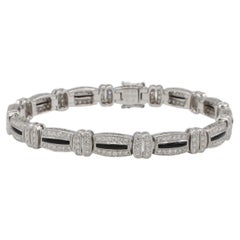 A. Simon G. Bracelet en or blanc 18 carats, diamant naturel et onyx noir, style Art déco