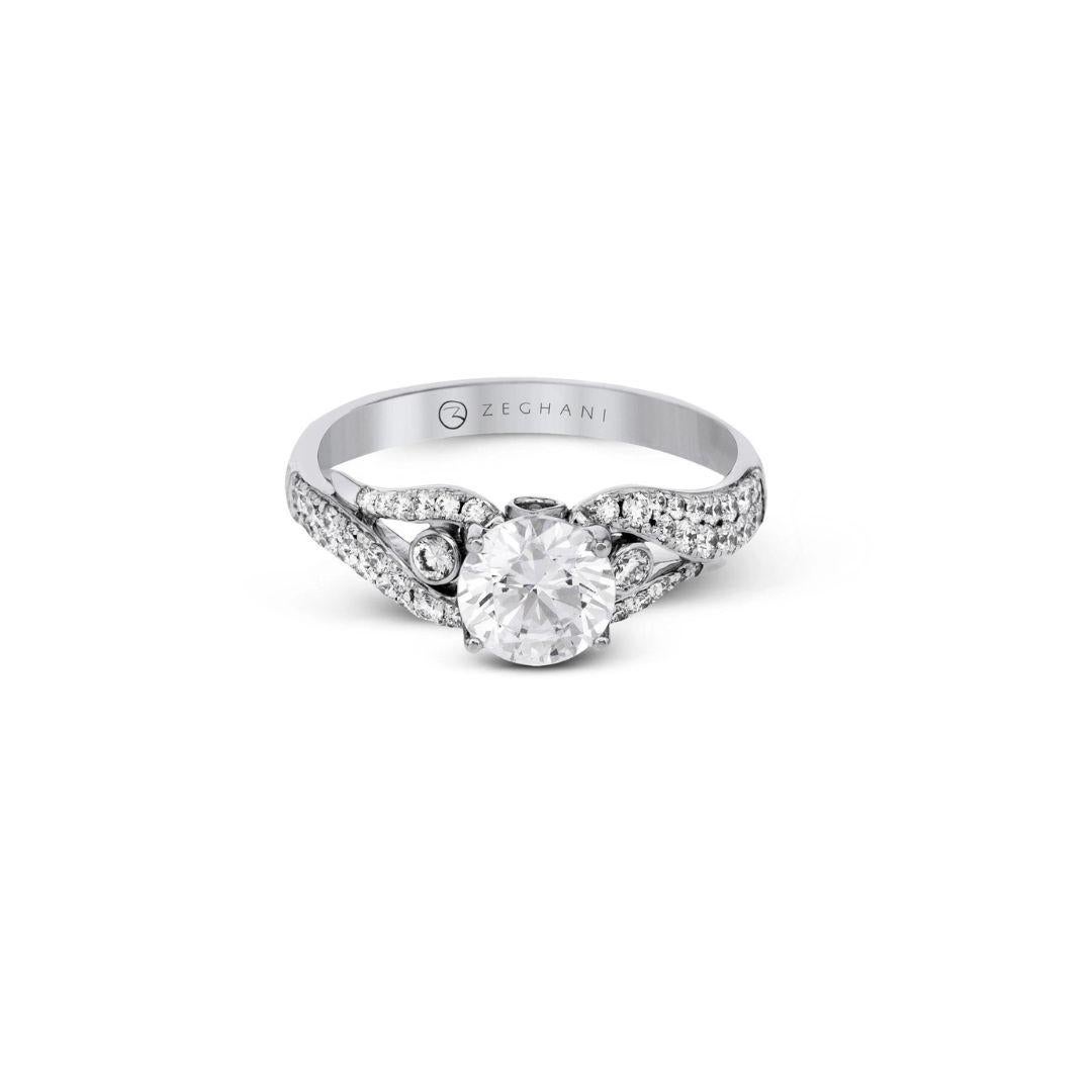 This gorgeous diamond engagement mounting is a perfect part of the Delicate Diva collection created by couture bridal designer Simon G for Zeghani. Ring contains 0.39 ctw of pave set white diamonds, G color, VS2 clarity. Center Diamond NOT Included. 