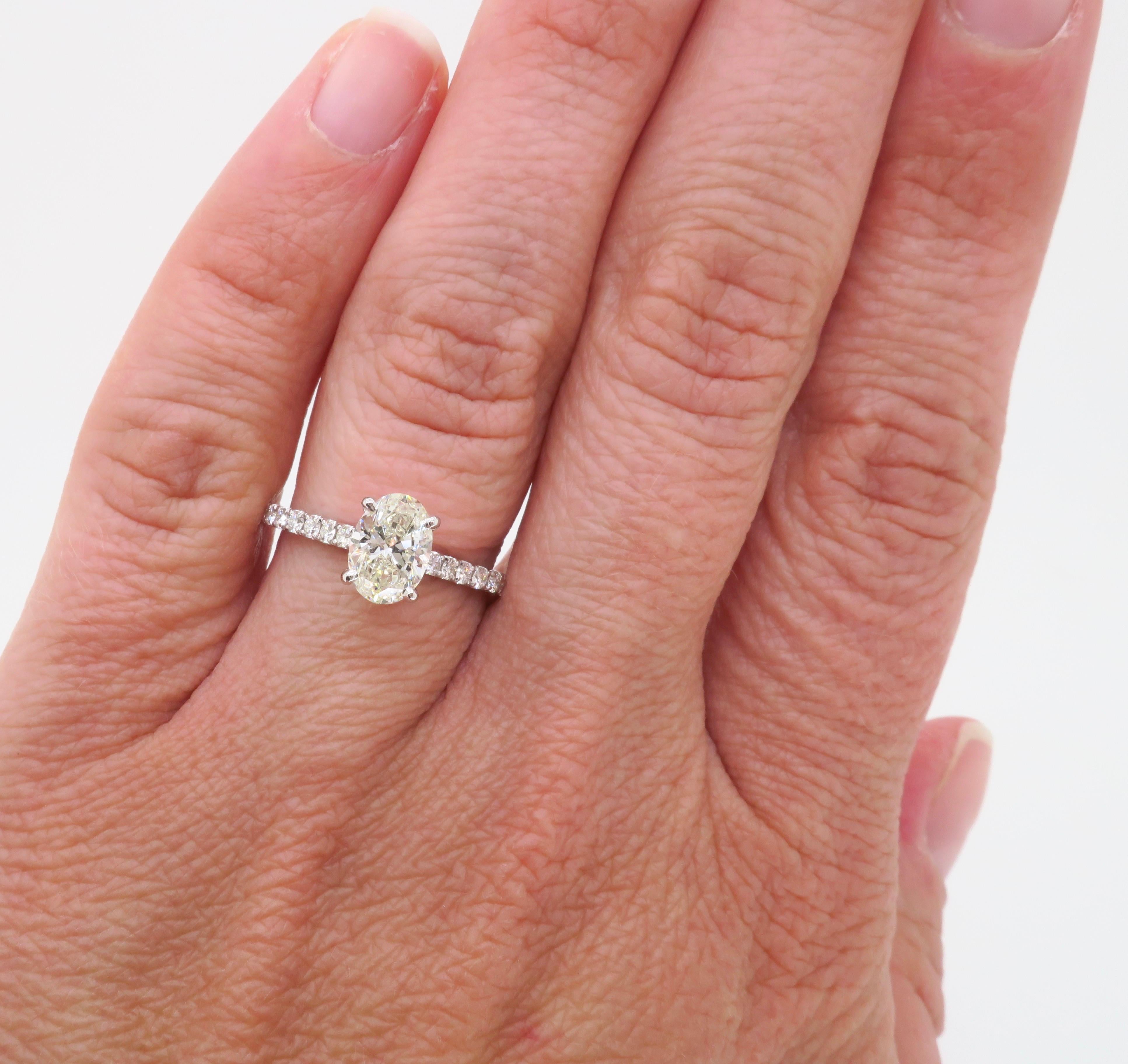 Beautiful Oval diamond set in a classic pavé set diamond engagement ring made by Simon G in 18k white gold. 

Diamond Carat Weight: 1.02CT
Diamond Cut: Oval Brilliant
Diamond Color: J
Diamond Clarity: SI2
Total Diamond Carat Weight: 1.28CTW
Metal:
