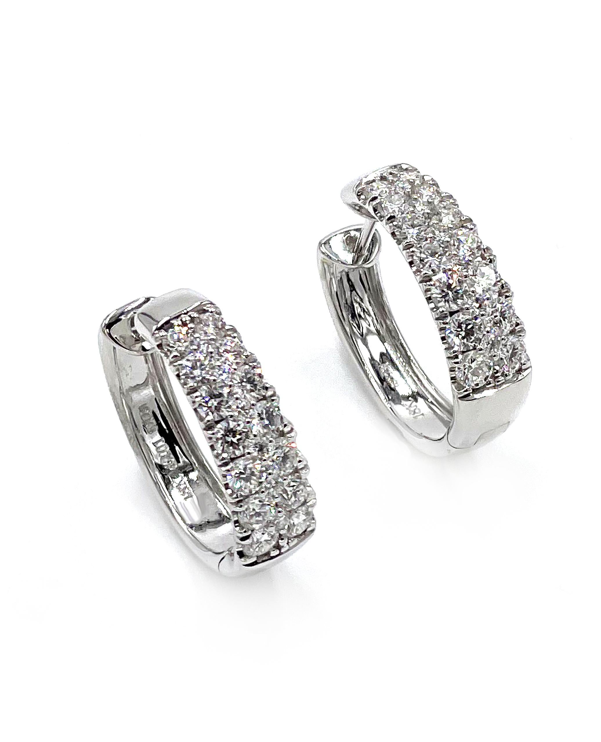 Simon G. 18K white gold hoop earrings with 40 round brilliant-cut pave set diamonds totaling 2.01 carats.

* Style No. LE4391
* Diamonds are G color, VS2/SI1 clarity
