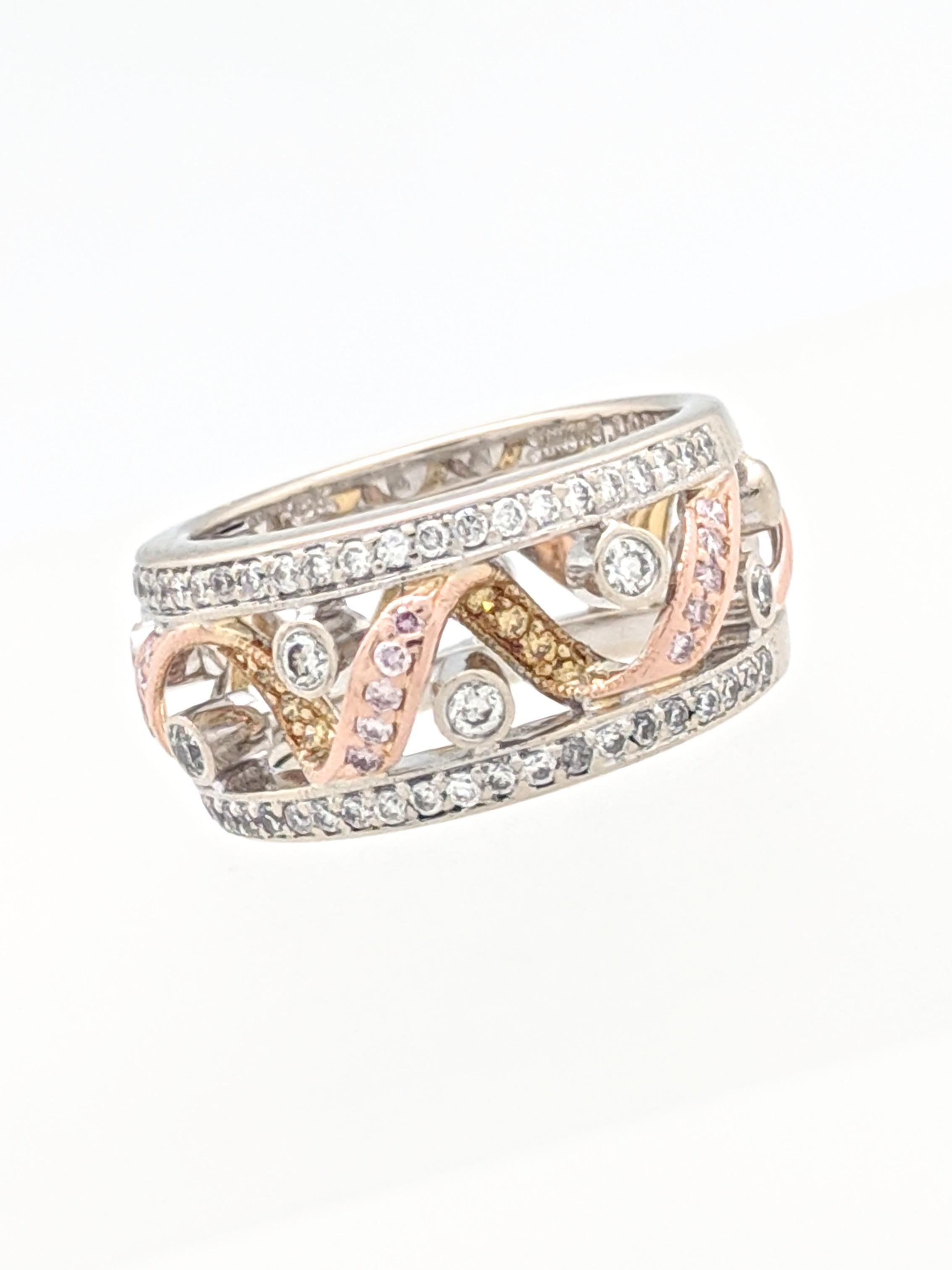 Simon G. LP1697 Ladies Tri-color Diamond Wedding Band

You are viewing a Beautiful Simon G Ladies Tri-Color Wedding Band with Diamonds.

The band is crafted from 18k tri-gold and weighs 7.8 grams. It features 0.06tcw of yellow diamonds, 0.40tcw of