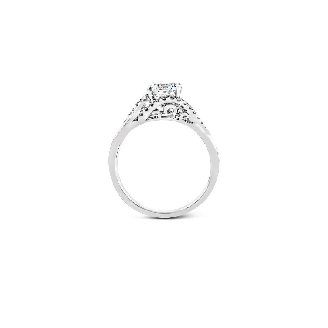 This twisted and modern engagement mounting by Zeghani is an important addition to our Nature Lover Collection with .18ctw of white diamonds set in 14K white gold. Center Diamond NOT Included. 