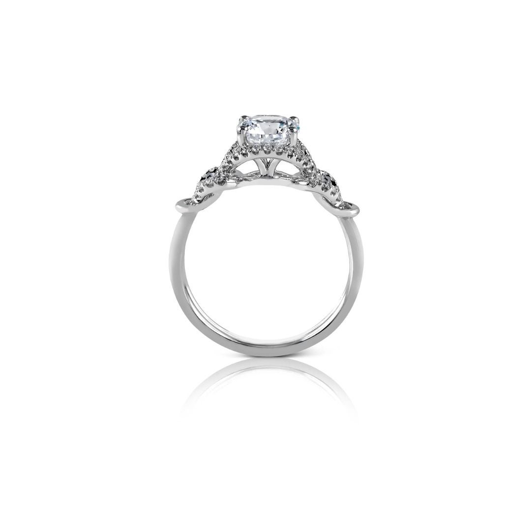 This is the perfect engagement mounting for a romantic girl. The twist on this vintage inspired engagement ring is an important addition to Zeghani's Delicate Diva Collection by couture bridal designer Simon G. The ring contains 0.21ctw of white