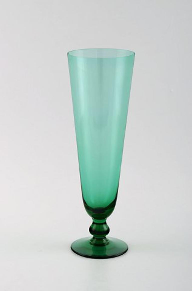 Simon gate for Orrefors, a set of six green champagne glass.
Designer: Simon Gate.
Measures: Height 21 cm, diameter 7 cm.
In perfect condition.