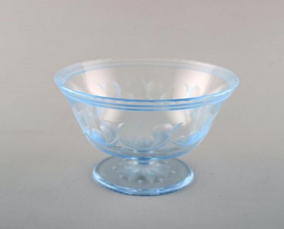 Simon Gate for Orrefors, Art Deco bowl on foot in satin-cut light blue art glass. 1928.
Measures: 13 x 7.5 cm.
In perfect condition.
Signed and dated.