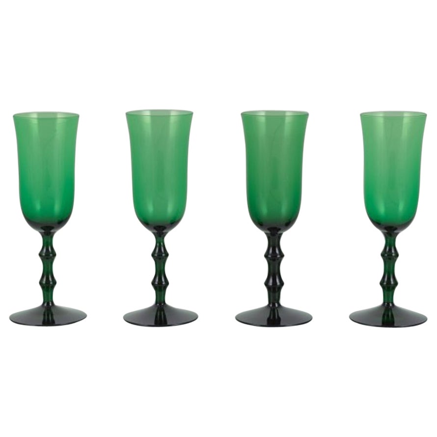Simon Gate for Orrefors, Sweden. Four "Salut" champagne glasses.