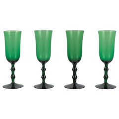 Simon Gate for Orrefors, Sweden. Four "Salut" champagne glasses.
