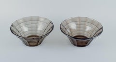 Simon Gate for Orrefors. Two large bowls in smoked-coloured pressed glass.