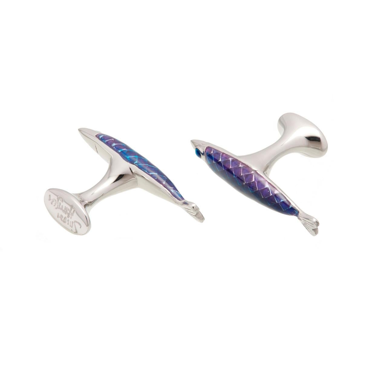 Enamelled fish in iridescent hues features humorous undercurrents: an illustrative detailed skeleton on the back. The Electra collection embodies power and strength named after the wife of the ancient Greek Sea God Thaumas, Electra presided over the