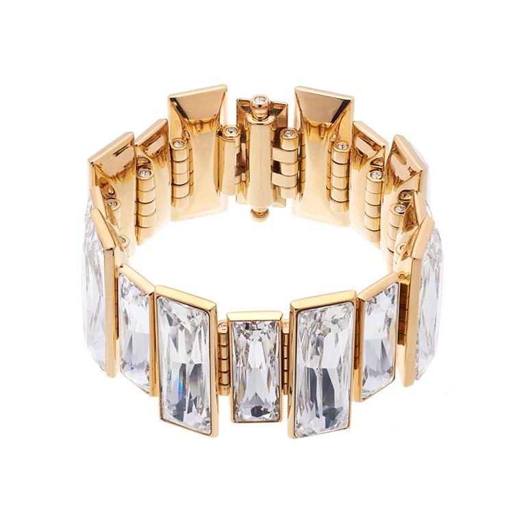 Striking Swarovski baguette crystals sparkle with every movement in their hand-crafted stone setting. A true statement of glamour. This luxurious statement bracelet sits delicately on your wrist, creating the perfect touch of sparkle for any