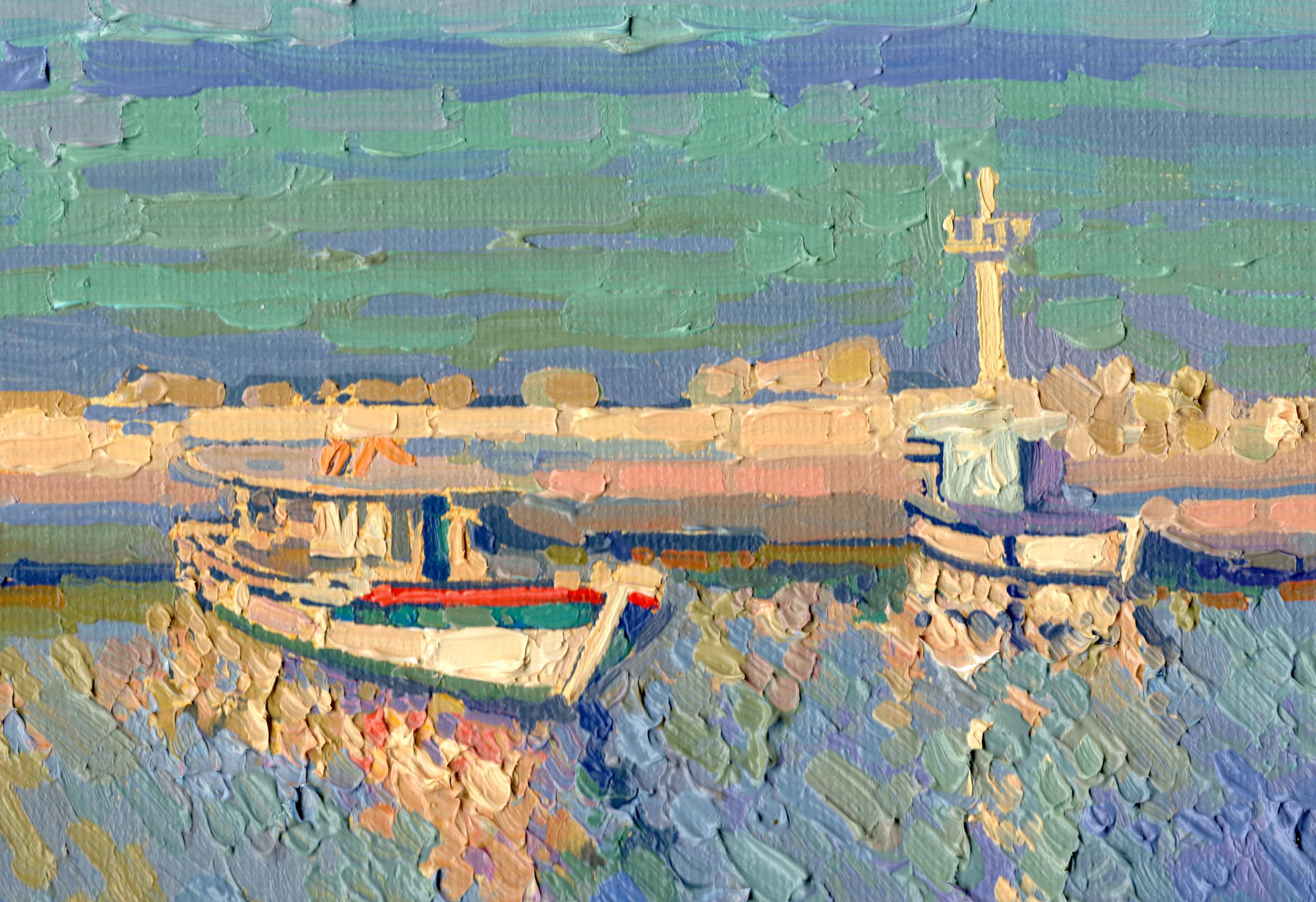La vista del puerto del pueblo de Bali, en Grecia, en la isla de Creta, es absolutamente hipnotizadora, y el color del atardecer cambia rápidamente. Una sombra fría recorre literalmente el agua y sumerge todos los objetos en sí misma. Barcos de