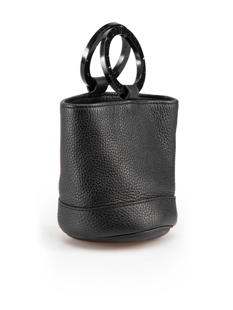CONDITION is Very good. Hardly any visible wear to bag is evident on this used Simon Miller designer resale item. This item comes with original dust bag.
 
Details
Mini Bonsai
Black
Leather
Mini bucket bag
1x Main open compartment
2x Round handles
