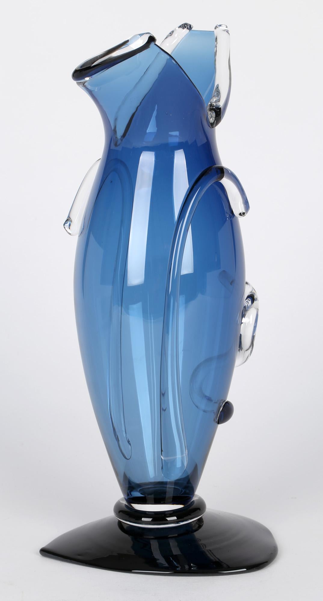 A very stylish modern English hand blown art glass vase by renowned glass maker Simon Moore (b.1959) dated 1989. Simon Moore has a had highly successful career since graduation in 1981 and has held a Visiting Professor title at the Royal College of