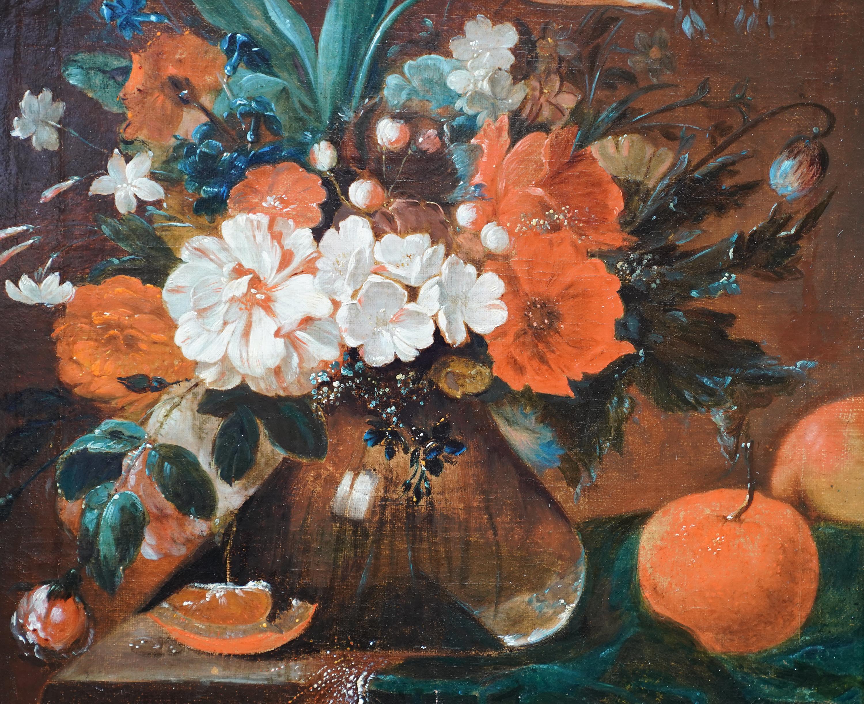 This superb Dutch Old Master floral still life oil painting is attributed to circle of Simon Pietersz Verelst. Painted circa 1700 the composition is a glass vase of mixed mostly red and white flowers on a table and fringed cloth with two apples next