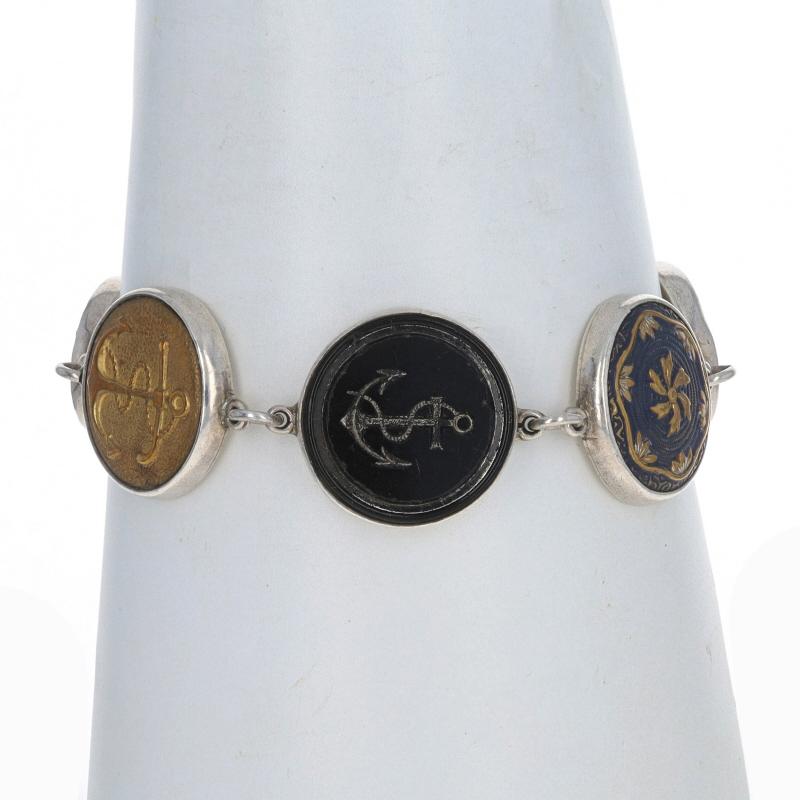 Marke: Simon Sebbag Entwürfe
Entwurf: Vintage-Buttons

Metallgehalt: Sterling Silber

Stil: Link
Verschluss-Typ: Knebelschließe
Thema: Nautische Anker, Wikingerschiff

Messungen
Länge: 8